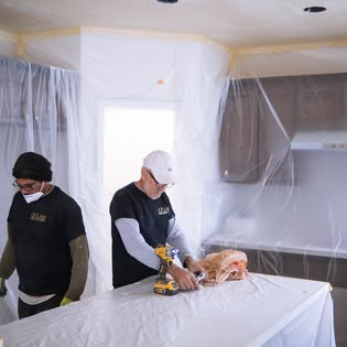 O’Live crew protecting an interior workspace