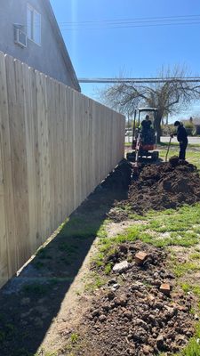 Crew working on a main water line excavation